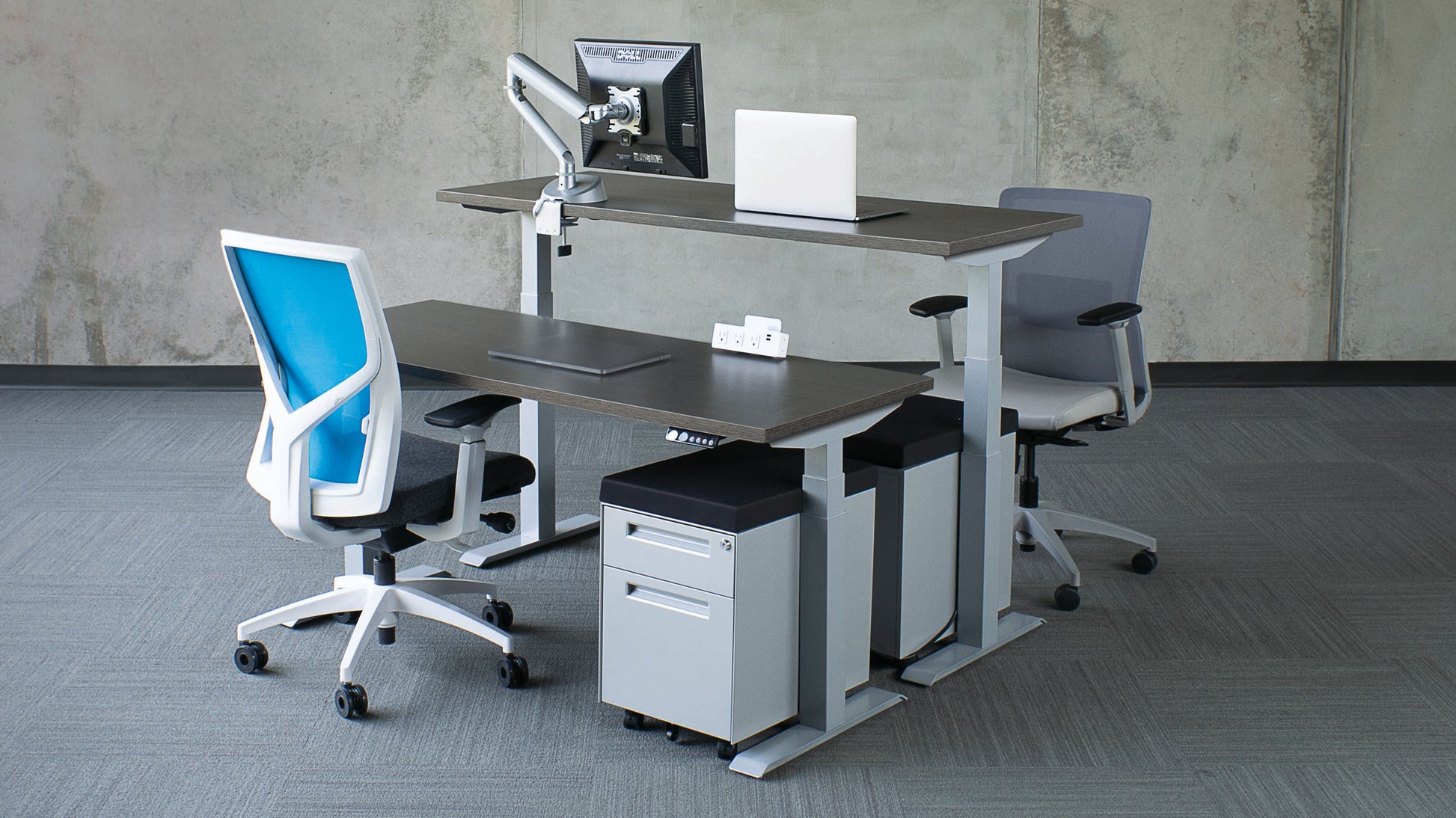SitOnIt Switchback 3-stage desk in a workspace